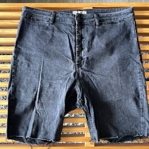 Free people washed black denim shorts, expose front button detail size 34